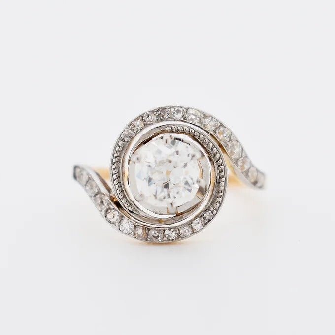 bague tourbillon or platine diamants
