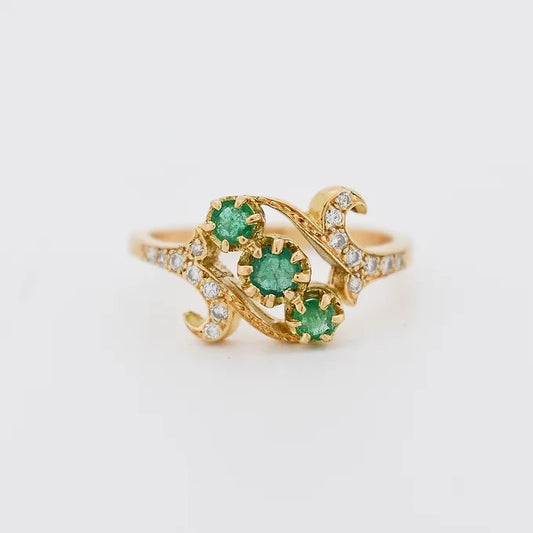 bague vintage or emeraude diamants trilogie